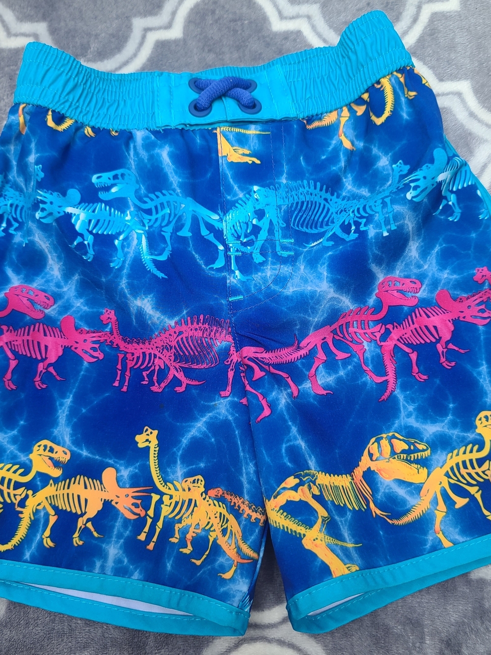 wonder nation Blue Dinosaur Skeleton Swim Shorts with Neon Print